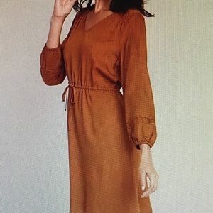 Mustard yellow 3/4 length sleeve dress.